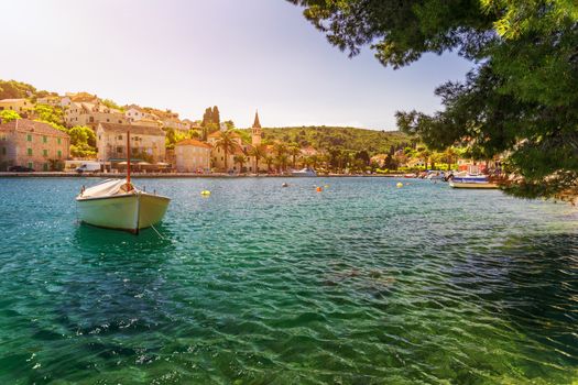 Fishing boats in Splitska village with beautiful port, Brac island, Croatia. Village of Splitska on Brac island seafront view, Dalmatia, Croatia, Croatia.