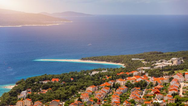 Zlatni Rat (Golden Cape or Golden Horn) famous turquoise beach in Bol town on Brac island, Dalmatia, Croatia. Zlatni Rat sandy beach at Bol on Brac island of Croatia in summertime.