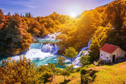 Krka national park with autumn colors of trees, famous travel destination in Dalmatia of Croatia. Krka waterfalls in the Krka National Park in autumn, Croatia.