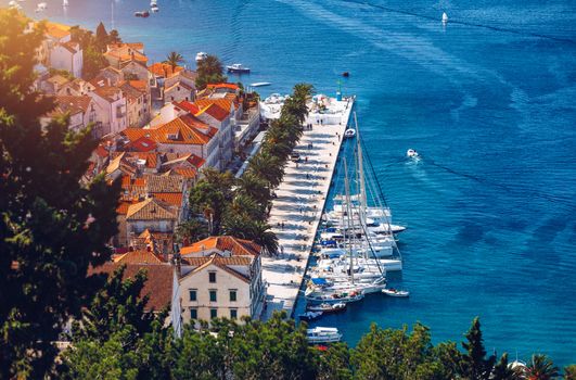 View at amazing archipelago with boats in front of town Hvar, Croatia. Harbor of old Adriatic island town Hvar. Popular touristic destination of Croatia. Amazing Hvar city on Hvar island, Croatia. 