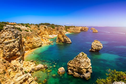 Praia da Marinha, beautiful beach Marinha in Algarve, Portugal. Navy Beach (Praia da Marinha), one of the most famous beaches of Portugal, located on the Atlantic coast in Lagoa Municipality, Algarve.
