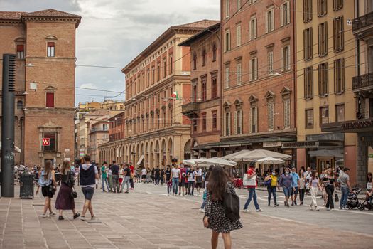 BOLOGNA, ITALY 17 JUNE 2020: People in Bologna walking on city center