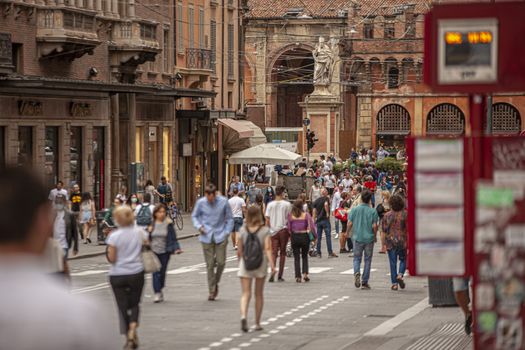 BOLOGNA, ITALY 17 JUNE 2020: People in Bologna walking on city center