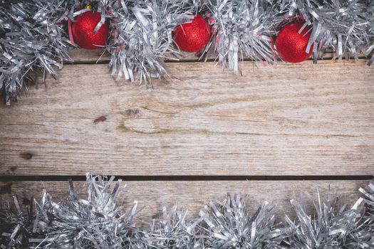 merry christmas concept with grey decoration on old wooden board