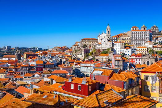 Panoramic view of Old city of Porto (Oporto) and Ribeira over Douro river, Portugal. Concept of world travel, sightseeing and tourism.