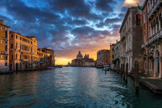 Sunrise in Venice. Image of Grand Canal in Venice, with Santa Maria della Salute Basilica in the background. Venice is a popular tourist destination of Europe. Venice, Italy.