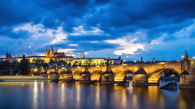 Famous iconic image of Prague castle and Charles Bridge, Prague, Czech Republic. Concept of world travel, sightseeing and tourism.