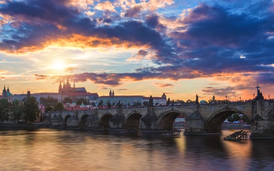 Famous iconic image of Charles bridge, Prague, Czech Republic. Concept of world travel, sightseeing and tourism.