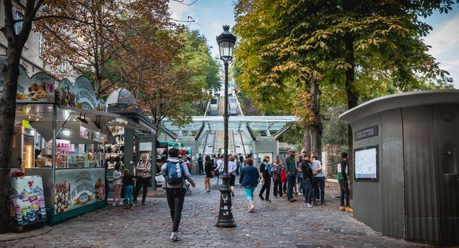 Paris, France - October 6, 2018: people who wait for the next funicular in the station to climb on the Montmartre