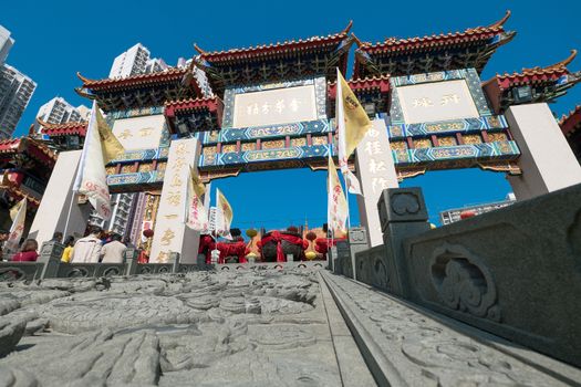 Kowloon, Hong Kong, China - JANUARY 13, 2016: people praying at Sik Sik Yuen Wong Tai Sin Temple,Wong Tai Sin also known as Huang Chu-ping