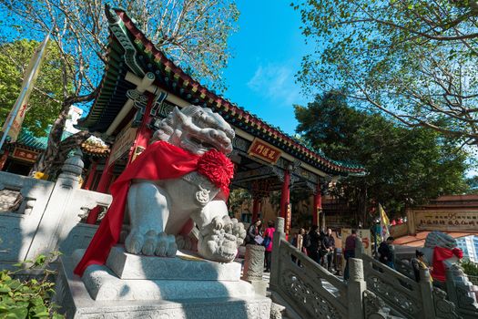 Kowloon, Hong Kong, China - JANUARY 13, 2016: people praying at Sik Sik Yuen Wong Tai Sin Temple,Wong Tai Sin also known as Huang Chu-ping