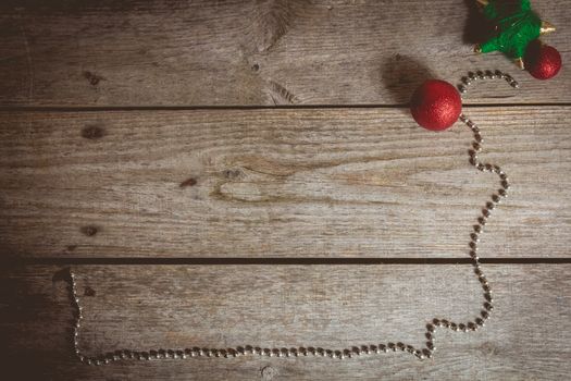 merry christmas concept with red decoration on old wooden board