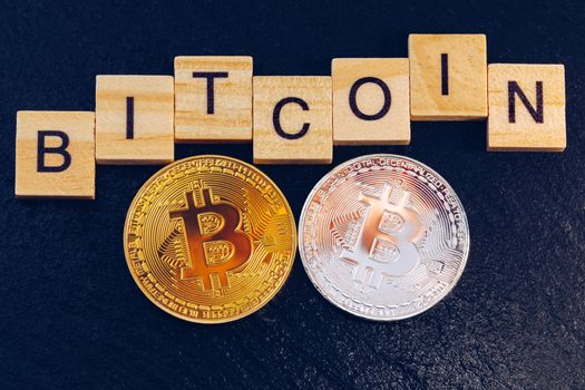 Bitcoin cryptocurrency (crypto currency). Silver Bitcoin and golden Bitcoin symbol. Bitcoin (BTC) cryptocurrency.
