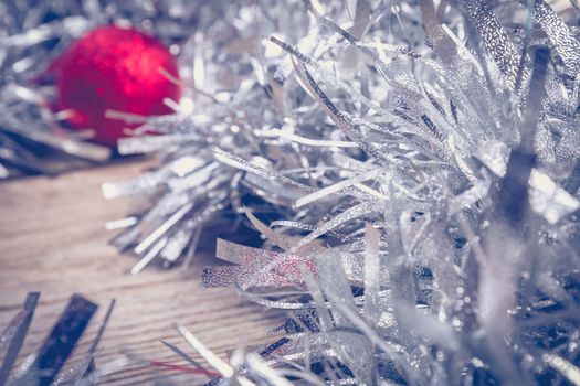 merry christmas concept with grey decoration on old wooden board