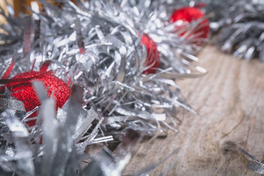 merry christmas concept with grey decoration on old wooden board