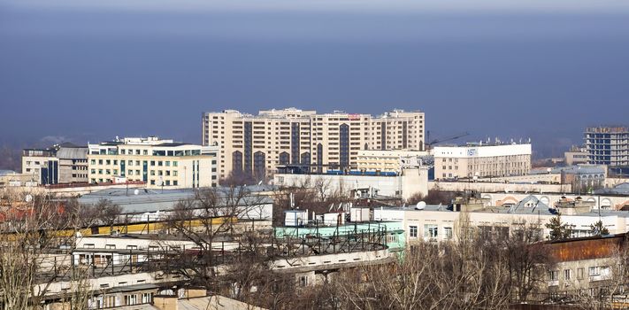 ALMATY, KAZAKHSTAN - FEBRUARY 6, 2016: Modern architecture in the historic centre of Almaty.

Almaty, Kazakhstan - February 6, 2016: Modern architecture in the historic centre of Almaty.