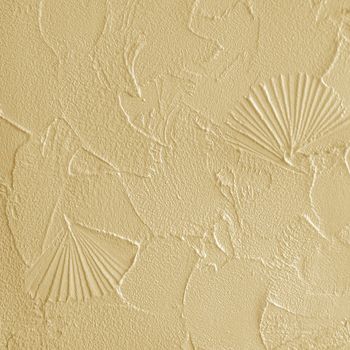 Yellow background of the structural plaster on the wall                         