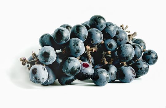 Purple grapes isolated on a white background