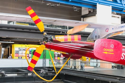 Paris, France - October 6, 2018 - Old Red Helicopter of Civil Security exhibited at the entrance of the City of Science and Industry during the Science Festival