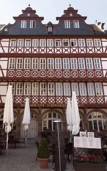 FRANKFURT AM MAIN, GERMANY - JULY 2, 2015: Buildings of Roemerberg square in Frankfurt, Germany. Frankfurt is the fifth-largest city in Germany.

Frankfurt am Main, Germany - July 2, 2015: Buildings of Roemerberg square in Frankfurt, Germany. Frankfurt is the fifth-largest city in Germany.