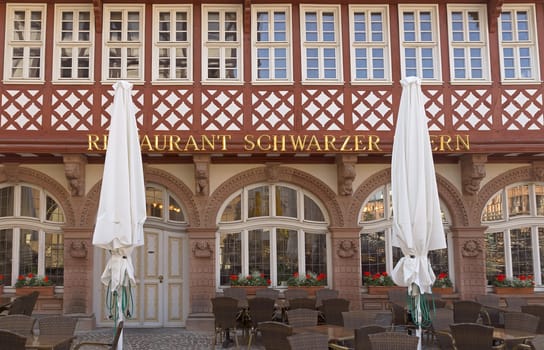 FRANKFURT AM MAIN, GERMANY - JULY 2, 2015: Buildings of Roemerberg square in Frankfurt, Germany. Frankfurt is the fifth-largest city in Germany.

Frankfurt am Main, Germany - July 2, 2015: Buildings of Roemerberg square in Frankfurt, Germany. Frankfurt is the fifth-largest city in Germany.