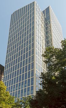 FRANKFURT AM MAIN, GERMANY - JULY 2, 2015: Skyscraper of Frankfurt am Main. Frankfurt is the fifth-largest city in Germany.

Frankfurt am Main, Germany - July 2, 2015: Skyscraper of Frankfurt am Main. Frankfurt is the fifth-largest city in Germany.