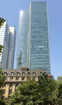 FRANKFURT AM MAIN, GERMANY - JULY 2, 2015: Skyscrapers of Frankfurt am Main. Frankfurt is the fifth-largest city in Germany.

Frankfurt am Main, Germany - July 2, 2015: Skyscrapers of Frankfurt am Main. Frankfurt is the fifth-largest city in Germany.