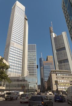 FRANKFURT AM MAIN, GERMANY - JULY 2, 2015: Skyscrapers of Frankfurt am Main. Frankfurt is the fifth-largest city in Germany.

Frankfurt am Main, Germany - July 2, 2015: Skyscrapers of Frankfurt am Main. Frankfurt is the fifth-largest city in Germany.
