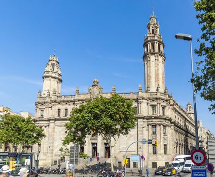 BARCELONA, SPAIN - JULY 6, 2015: Architecture of port Vell in Barcelona, Spain.

Barcelona, Spain - July 6, 2015: Architecture of port Vell in Barcelona, Spain. People are walking by street.
