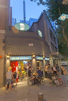 BARCELONA, SPAIN - JULY 4, 2015: Beer pub at Rambla del Poblenou in summer night - center of nightlife at Barcelona.

Barcelona, Spain - July 4, 2015: Beer pub at Rambla del Poblenou in summer night - center of nightlife at Barcelona. People are drinking.