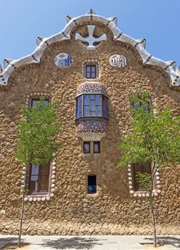 BARCELONA, SPAIN - JULY 6, 2015: Architecture of Park Guell by architect Antonio Gaudi.

Barcelona, Spain - July 6, 2015: Architecture of Park Guell by architect Antonio Gaudi.