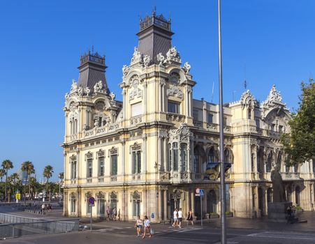 BARCELONA, SPAIN - JULY 6, 2015: Architecture of Port Vell.

Barcelona, Spain - July 6, 2015: Architecture of Port Vell, Barcelona, Spain. People are walking by street.