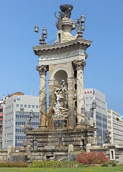 BARCELONA, SPAIN - JULY 8, 2015: The fountain at the centre of the Placa De Espanya, one of Barcelona's most important squares, built on the occasion of the 1929 International Exhibition.

Barcelona, Spain - July 8, 2015: The fountain at the centre of the Placa De Espanya, one of Barcelona's most important squares, built on the occasion of the 1929 International Exhibition.
