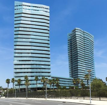 BARCELONA, SPAIN - JULY 7, 2015: New modern architecture in the Diagonal Mar i el Front Maritim del Poblenou area.

Barcelona, Spain - July 7, 2015: New modern architecture in the Diagonal Mar i el Front Maritim del Poblenou area. This is a new booming area with modern buildings. Diagonal Mar - District, built at the end of the past - the beginning of this century. The impetus for its development was the holding in the capital of Catalonia, the World Cultural Forum. Diagonal Mar is famous for its clean and tranquil beaches, upscale apartments and hotels.