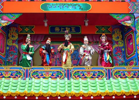 KAOHSIUNG, TAIWAN -- FEBRUARY 8, 2014: Puppets in traditional costumes are displayed at a temple in honor of the Jade Emperor's birthday, which falls on the 9th day of the Chinese New Year.