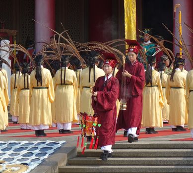 KAOHSIUNG, TAIWAN -- SEPTEMBER 28 , 2017: Ceremonial attendants in red robes take up positions for the yearly Confucius Ceremony held on Teachers Day.