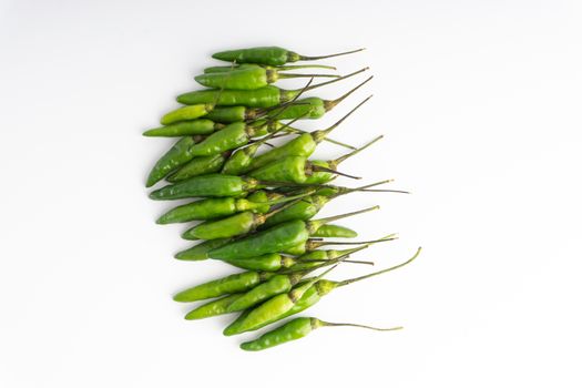 Green BirdÕs eye chili,Thai Chili pepper ,bird chili pepper nature isolate on white background. Selective focus and crop fragment