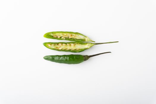 Green BirdÕs eye chili,Thai Chili pepper ,bird chili pepper nature isolate on white background. Selective focus and crop fragment