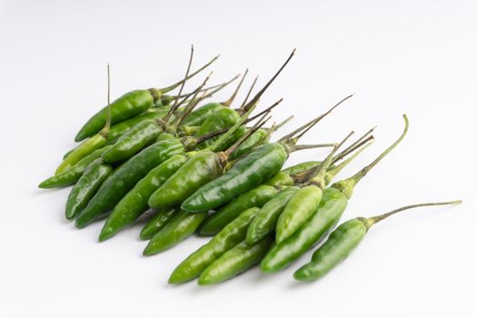 Green BirdÕs eye chili,Thai Chili pepper ,bird chili pepper nature isolate on white background. Selective focus and crop fragment