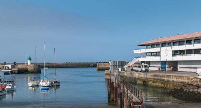 Port Joinville, France - September 18, 2018: view of the ferry terminal of the island of Yeu which makes the transport
  goods and people between the island and the continent