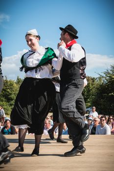Bretignolles sur Mer, France - July 14, 2016 : dancers in a traditional folk dance on the occasion of the national holiday