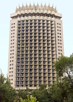 ALMATY, KAZAKHSTAN - JUNE 25, 2015: Hotel "Kazakhstan". It is a famous historical monument in center of Almaty city. Built in 1977.

Almaty, Kazakhstan - June 25, 2015: Hotel "Kazakhstan". It is a famous historical monument in center of Almaty city. Built in 1977.