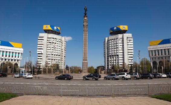 ALMATY, KAZAKHSTAN - APRIL 17, 2015: Monument of Independence of Kazakhstan. Monument was inaugurated on Republic Square December 16, 1996.

Almaty, Kazakhstan - April 17, 2015: Monument of Independence of Kazakhstan. Monument was inaugurated on Republic Square December 16, 1996. Tourists are standing near monument.