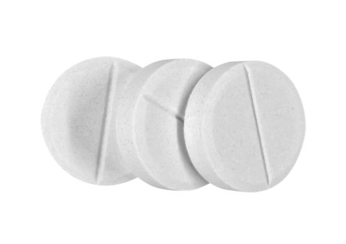 Three tablets of aspirin isolated on white. Clipping path included.