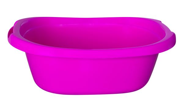 Empty rose baby plastic bath tub isolated on white. Clipping path included.