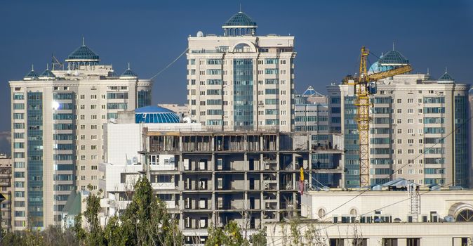 ALMATY, KAZAKHSTAN - OCTOBER 17, 2013: Modern architecture in the historic centre of Almaty.

Almaty, Kazakhstan - October 17, 2013: Modern architecture in the historic centre of Almaty.
