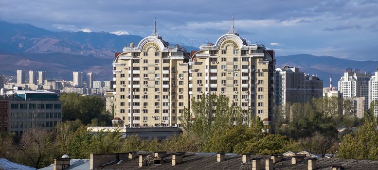 ALMATY, KAZAKHSTAN - OCTOBER 17, 2013: Modern architecture in the historic centre of Almaty.

Almaty, Kazakhstan - October 17, 2013: Modern architecture in the historic centre of Almaty.