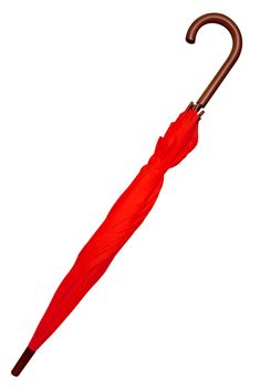 Folded red umbrella isolated on white background. Clipping path included.