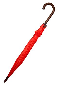 Folded red umbrella isolated on white background. Clipping path included.