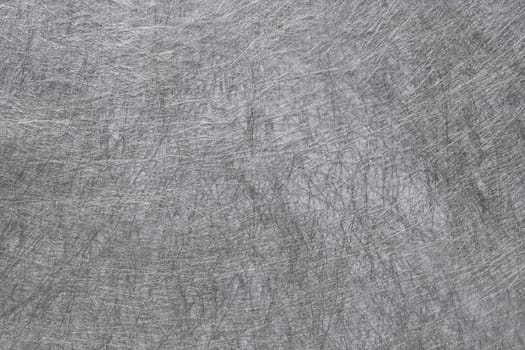 Closeup of metalic texture paper with fibers.
